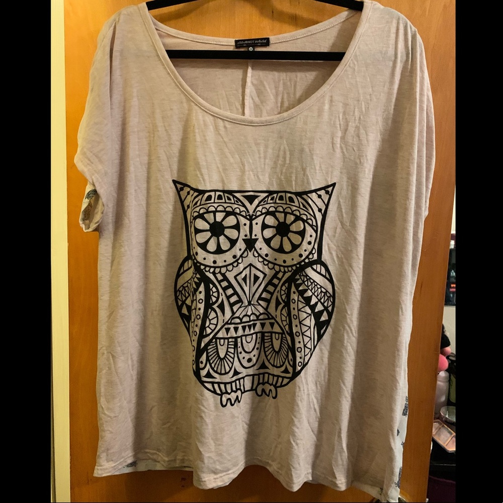 Cute owl shirt with mesh back.